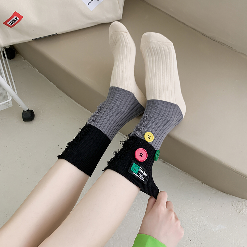 Stokin blok warna pengemis butang